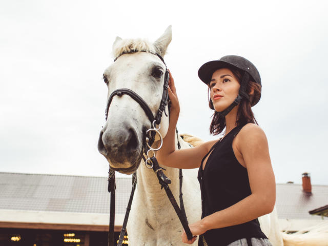 girls learn how to ride horses